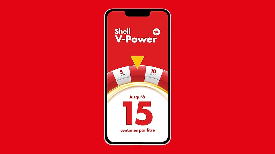 Sur fond rouge, smartphone avec « Shell V-Power jusqu’à 15 centimes par litre